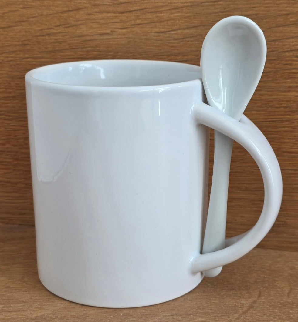 Tasse mit Löffel